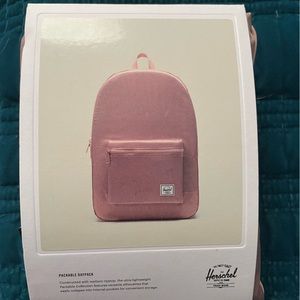 Ash rose packable daypack.